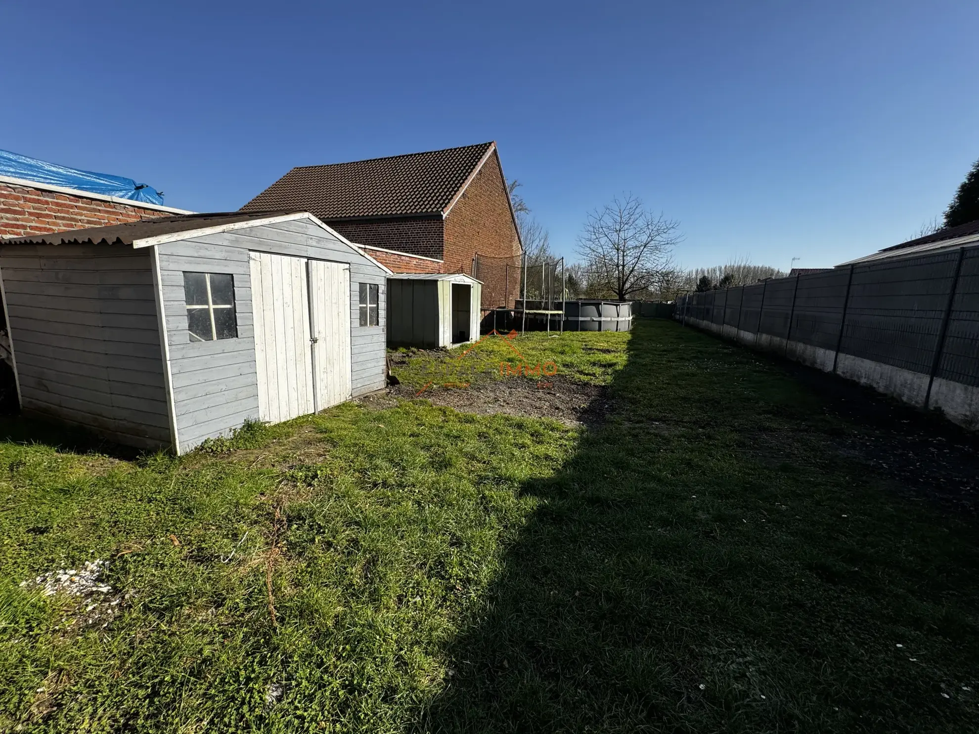 Maison semi-individuelle rénovée à Roeulx avec jardin et garage 