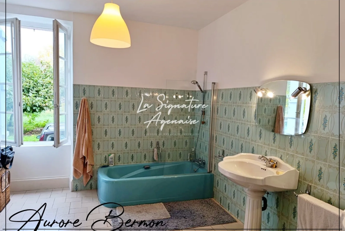 Belle maison en pierre de 253 m² avec terrain arboré de 3000 m² à Damazan 