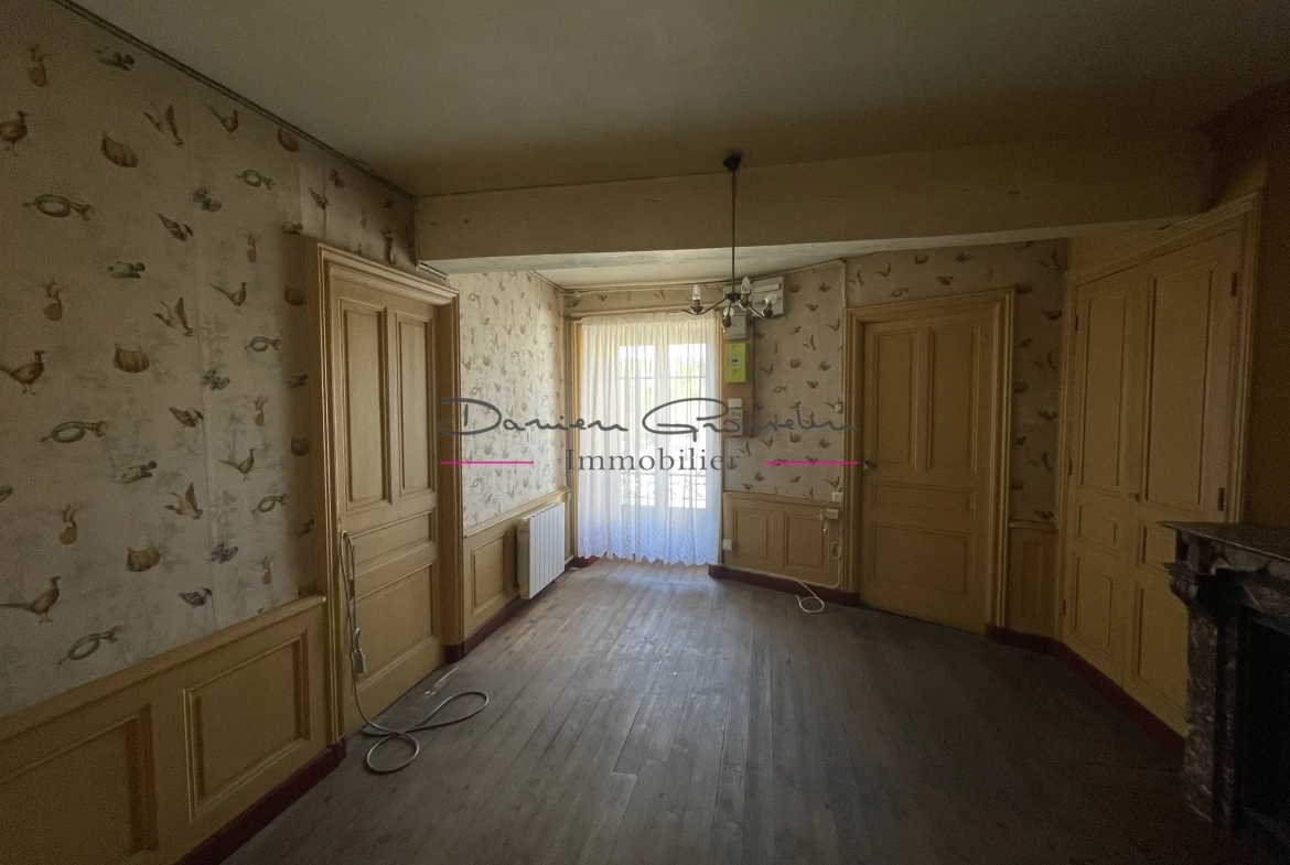 Maison de village à Thizy avec jardin et garage - Opportunité à rénover 