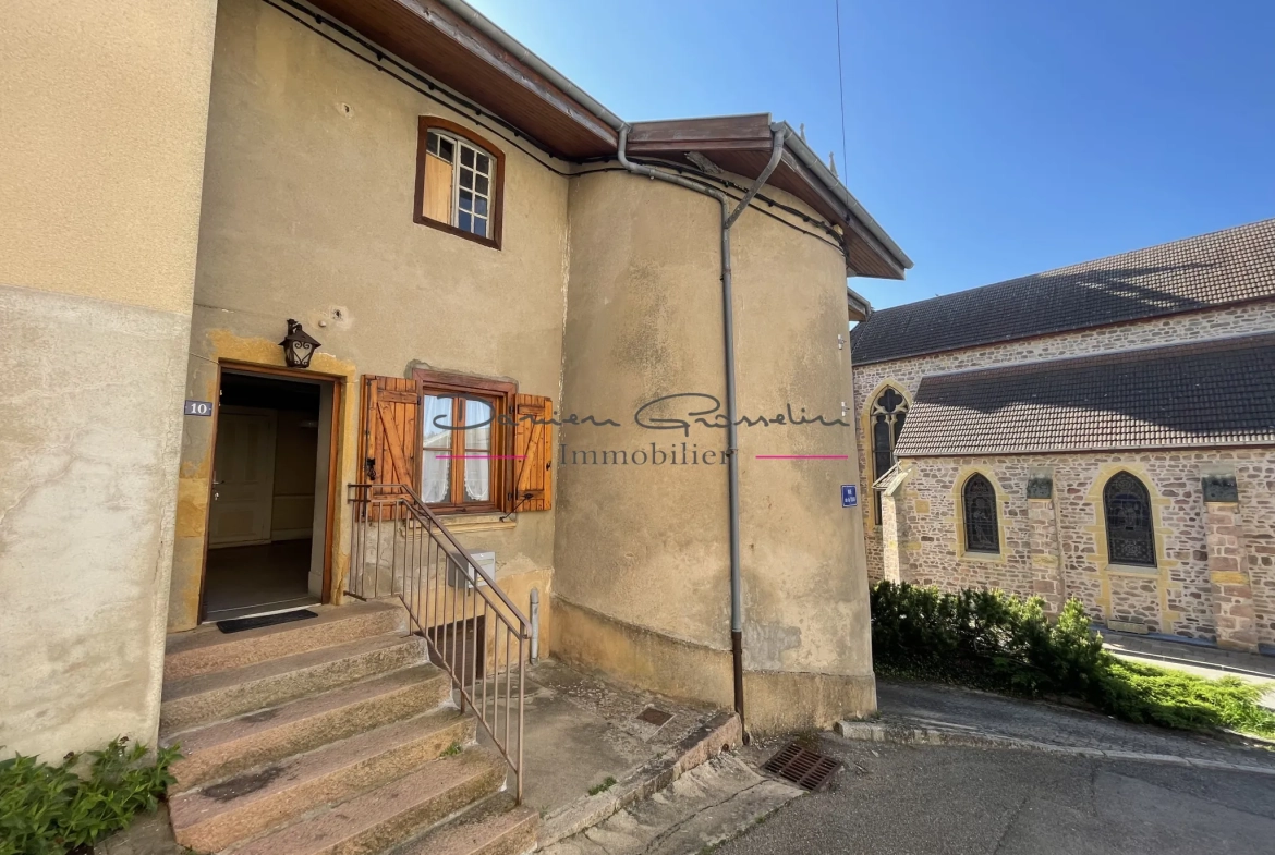 Maison de village à Thizy avec jardin et garage - Opportunité à rénover 