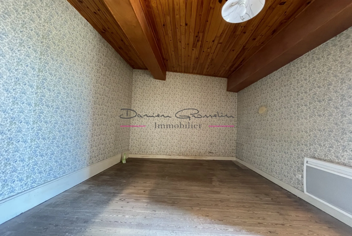 Maison de village à Thizy avec jardin et garage - Opportunité à rénover 
