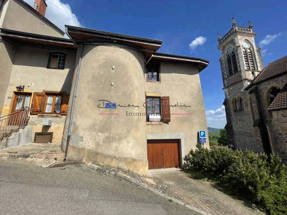 Maison de village à Thizy avec jardin et garage - Opportunité à rénover