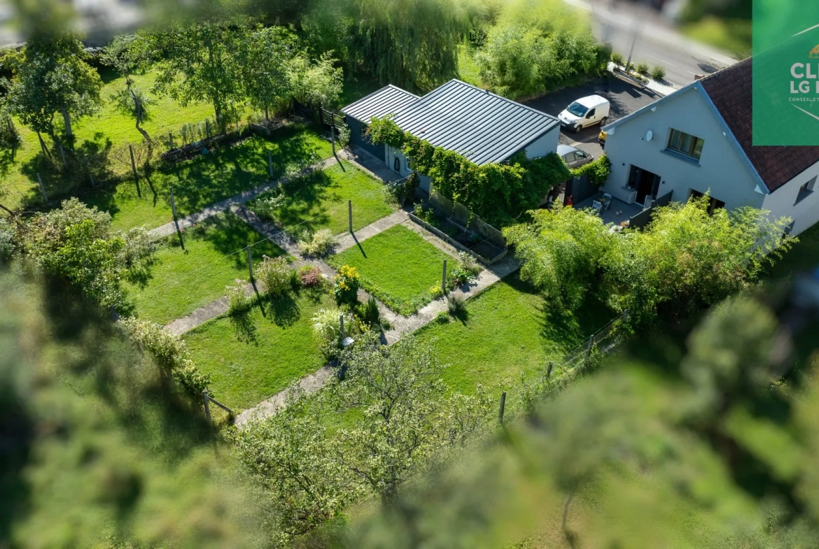 Maison 140 m² à Farébersviller avec terrasse, grands garages et jardin 