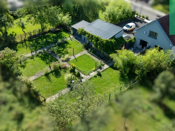 Maison 140 m² à Farébersviller avec terrasse, grands garages et jardin 