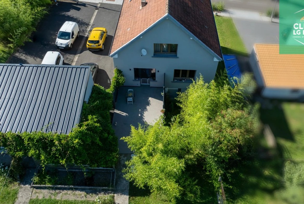 Maison 140 m² à Farébersviller avec terrasse, grands garages et jardin 