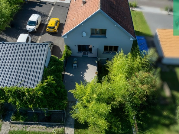 Maison 140 m² à Farébersviller avec terrasse, grands garages et jardin 