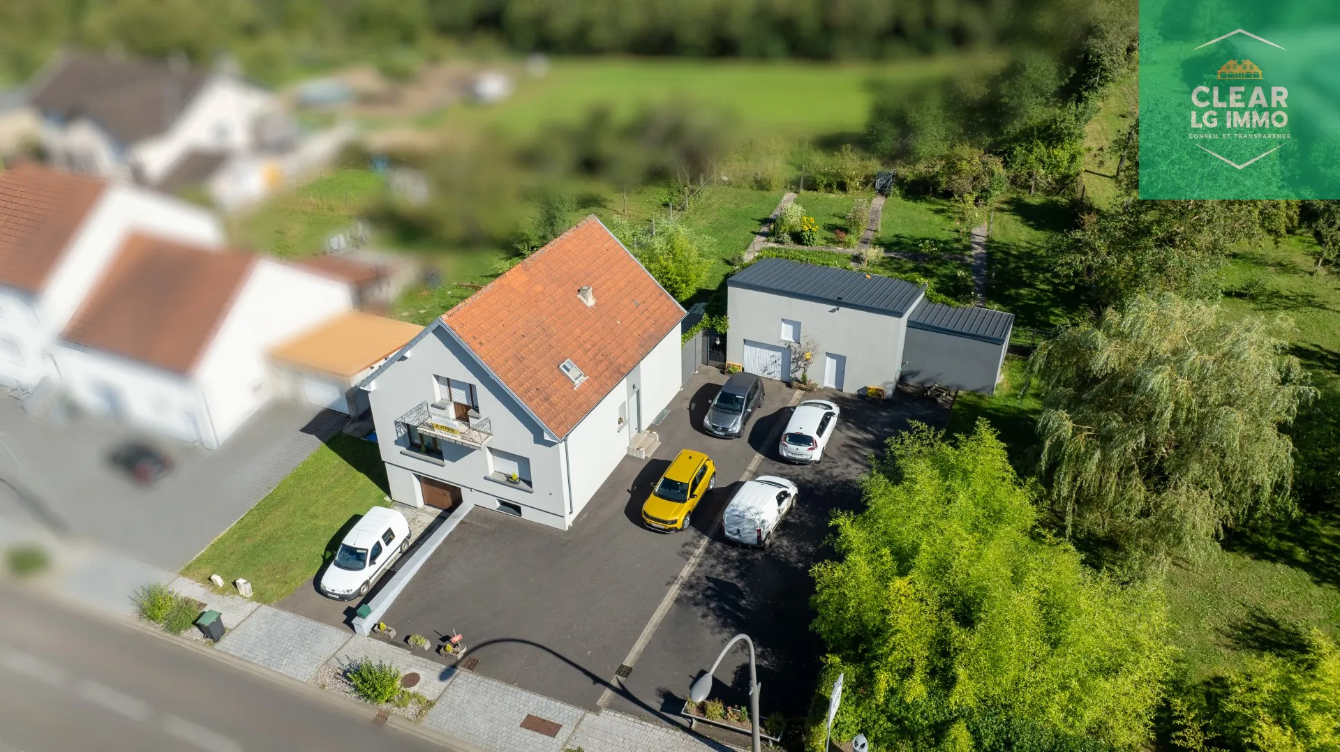 Maison 140 m² à Farébersviller avec terrasse, grands garages et jardin 