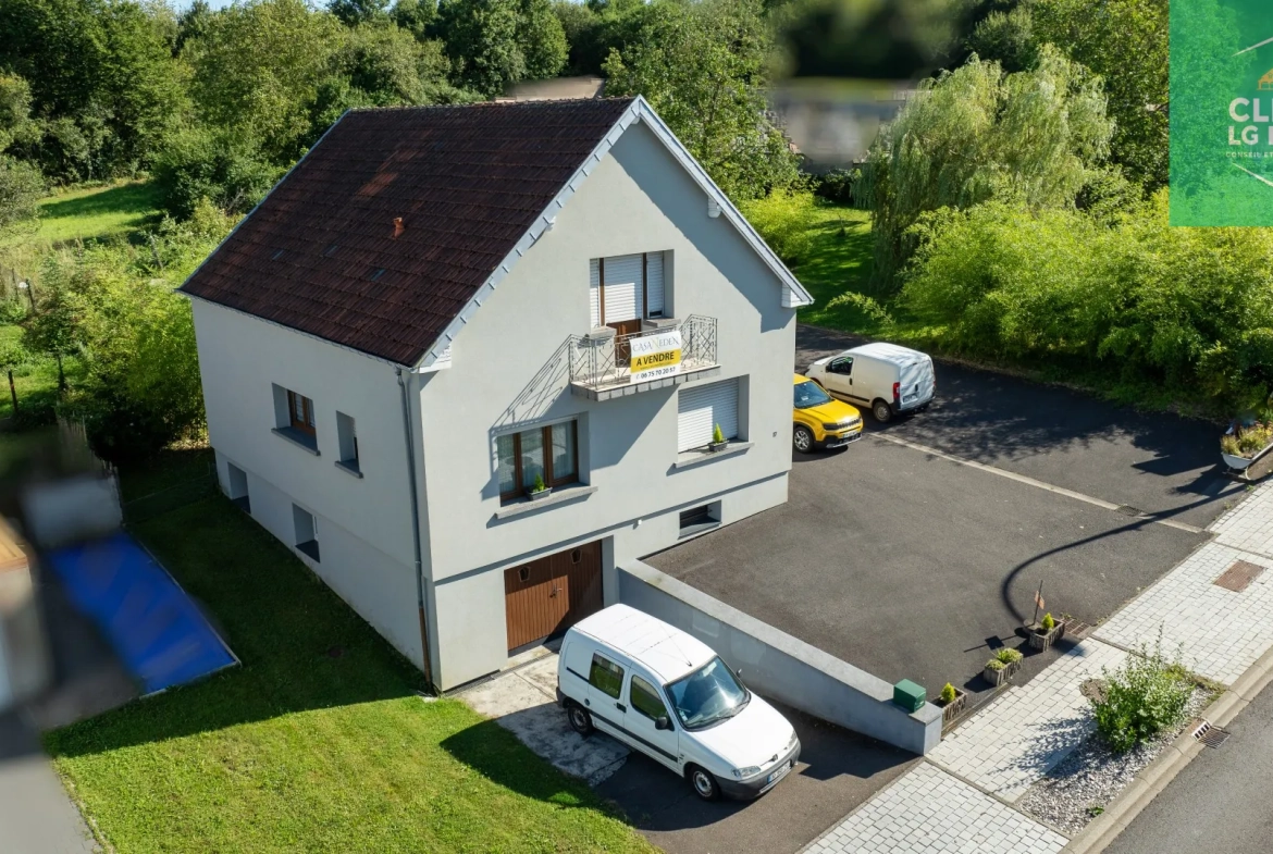 Maison 140 m² à Farébersviller avec terrasse, grands garages et jardin 
