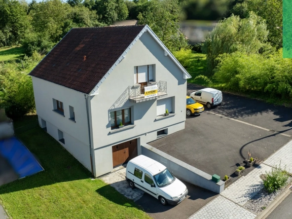 Maison 140 m² à Farébersviller avec terrasse, grands garages et jardin 