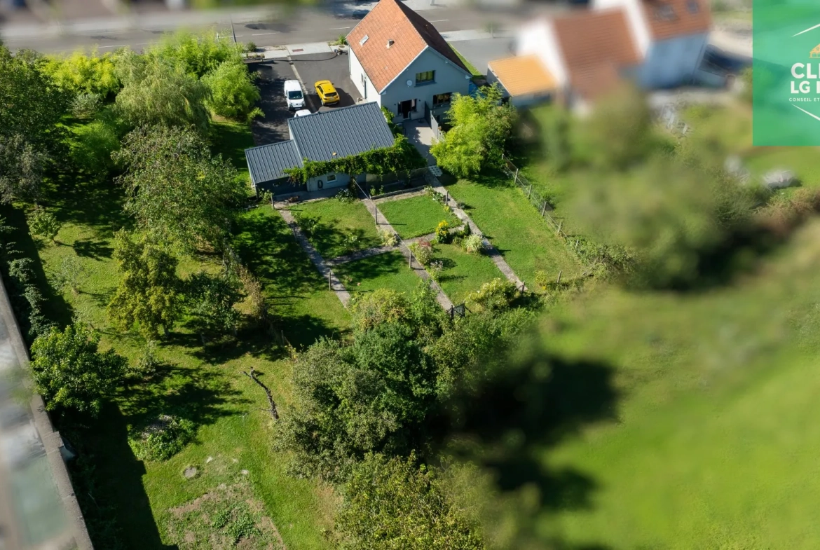 Maison 140 m² à Farébersviller avec terrasse, grands garages et jardin 