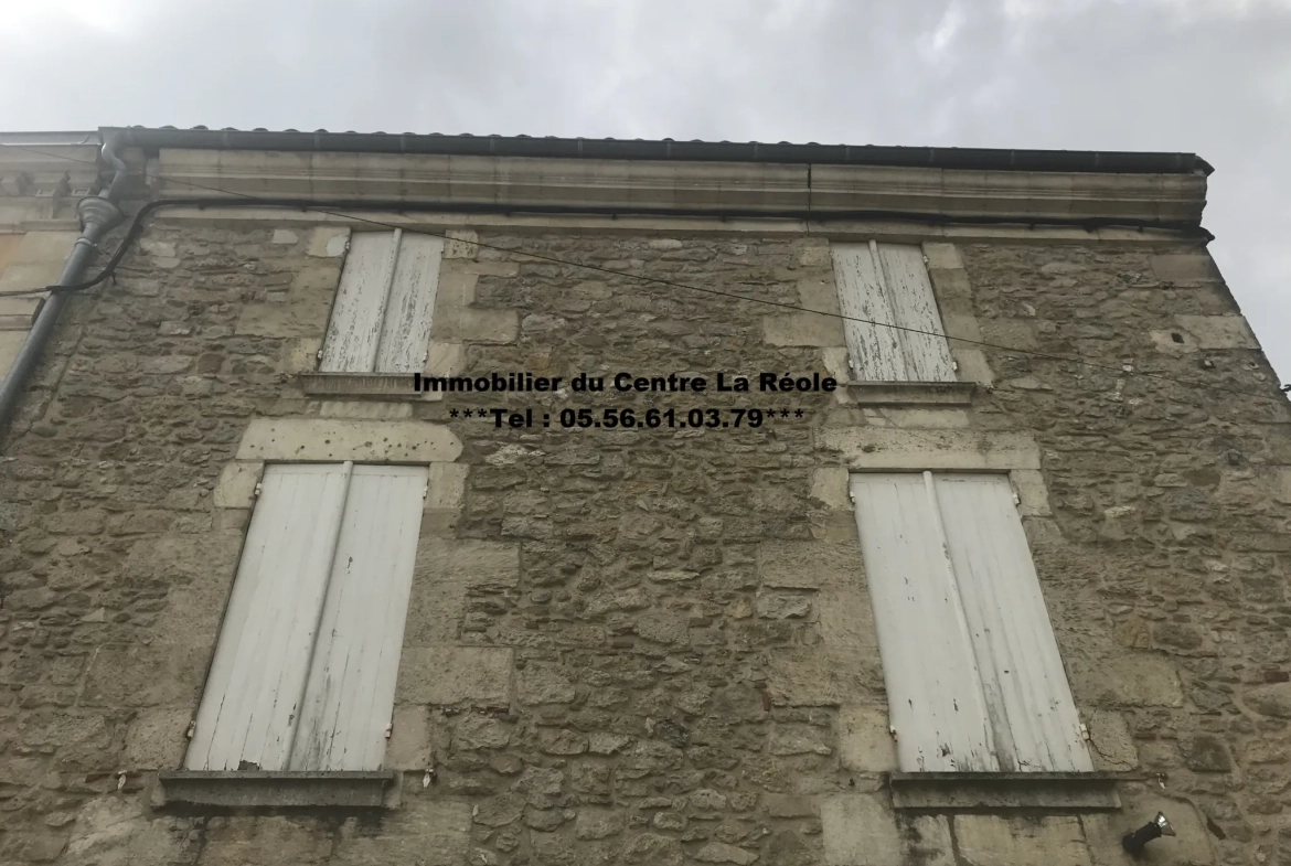 Immeuble en pierre de 370 m² au centre de La Réole, idéal pour investissement 