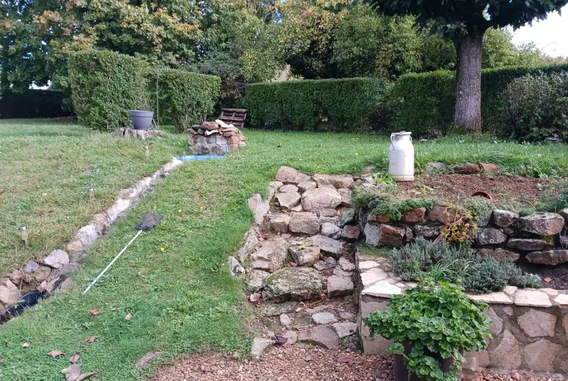 Maison de 98 m² à vendre à Condé-sur-Sarthe avec jardin et garage 