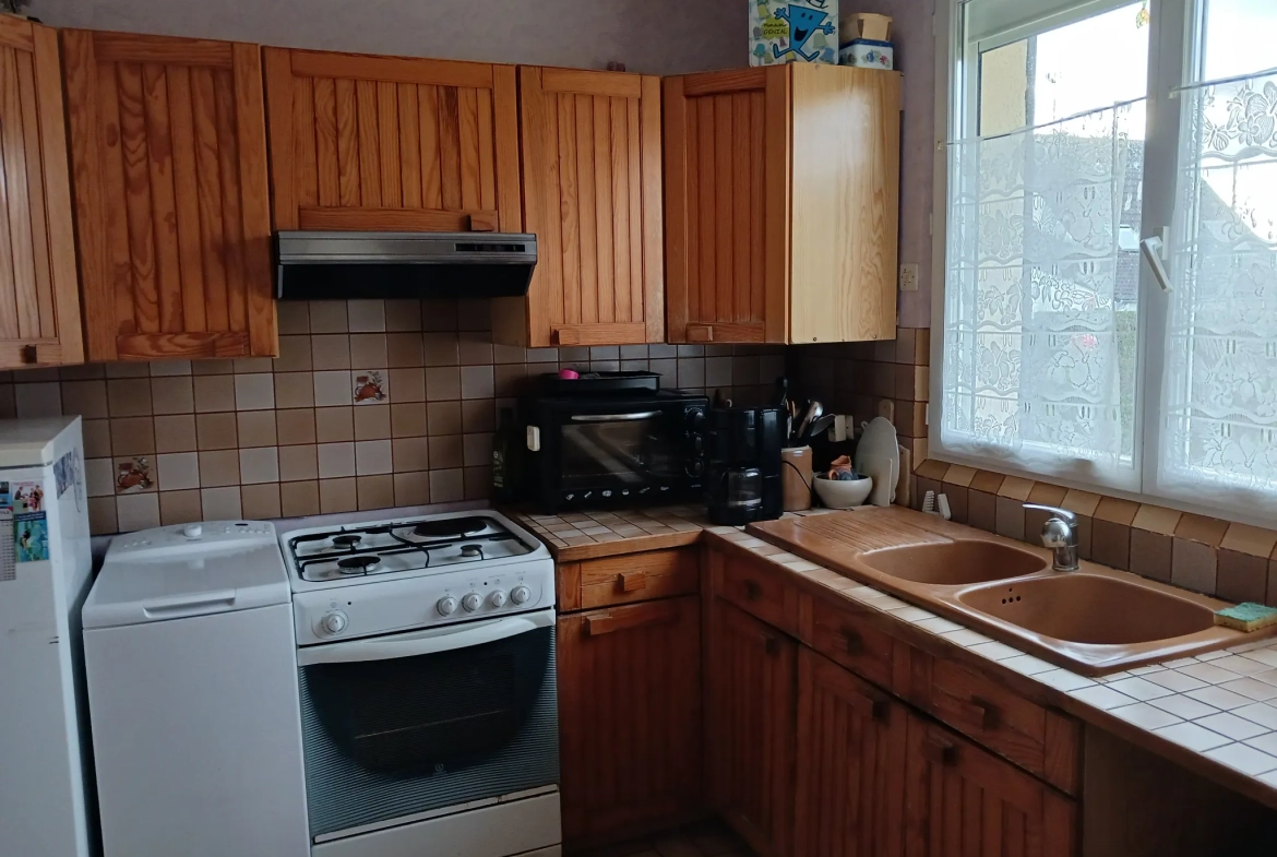 Maison de 98 m² à vendre à Condé-sur-Sarthe avec jardin et garage 