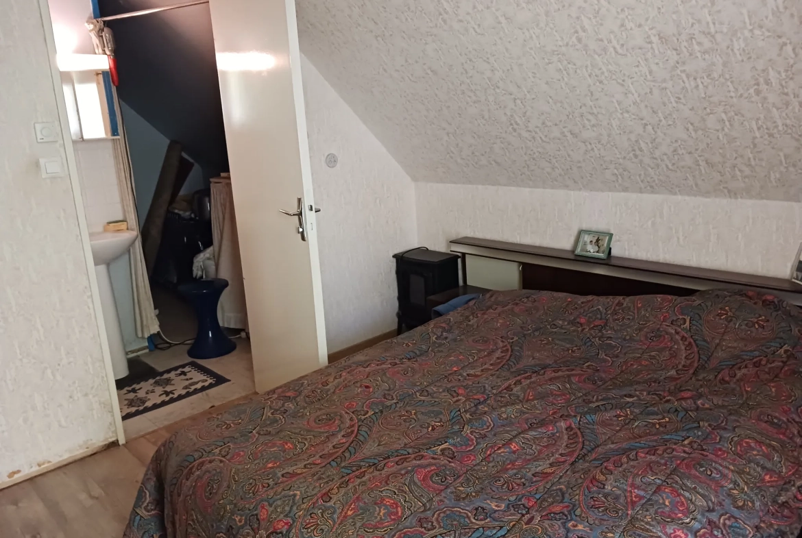 Maison de 98 m² à vendre à Condé-sur-Sarthe avec jardin et garage 