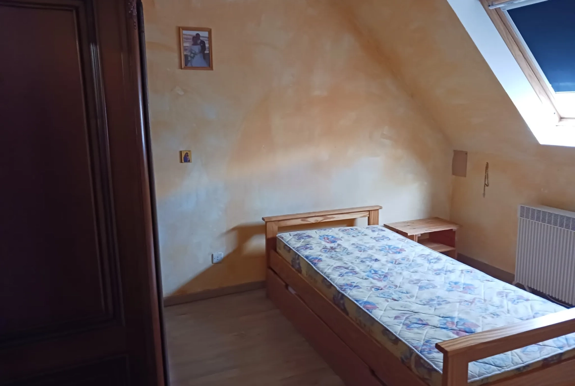 Maison de 98 m² à vendre à Condé-sur-Sarthe avec jardin et garage 