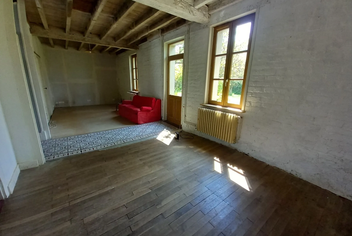 Charme maison de village avec potentiel de 2 chambres à La Chapelle aux Chasses 