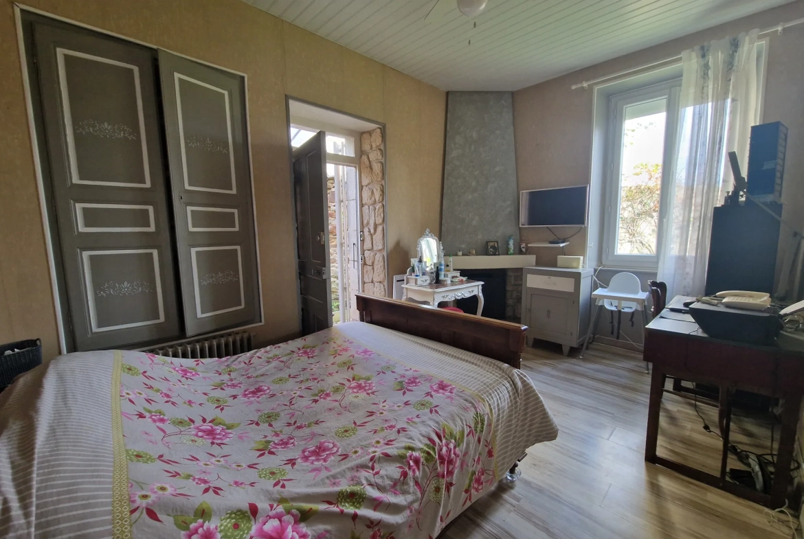 Maison en pierres avec extérieur cosy à Masseret, 4 chambres, jardin et accès facile 