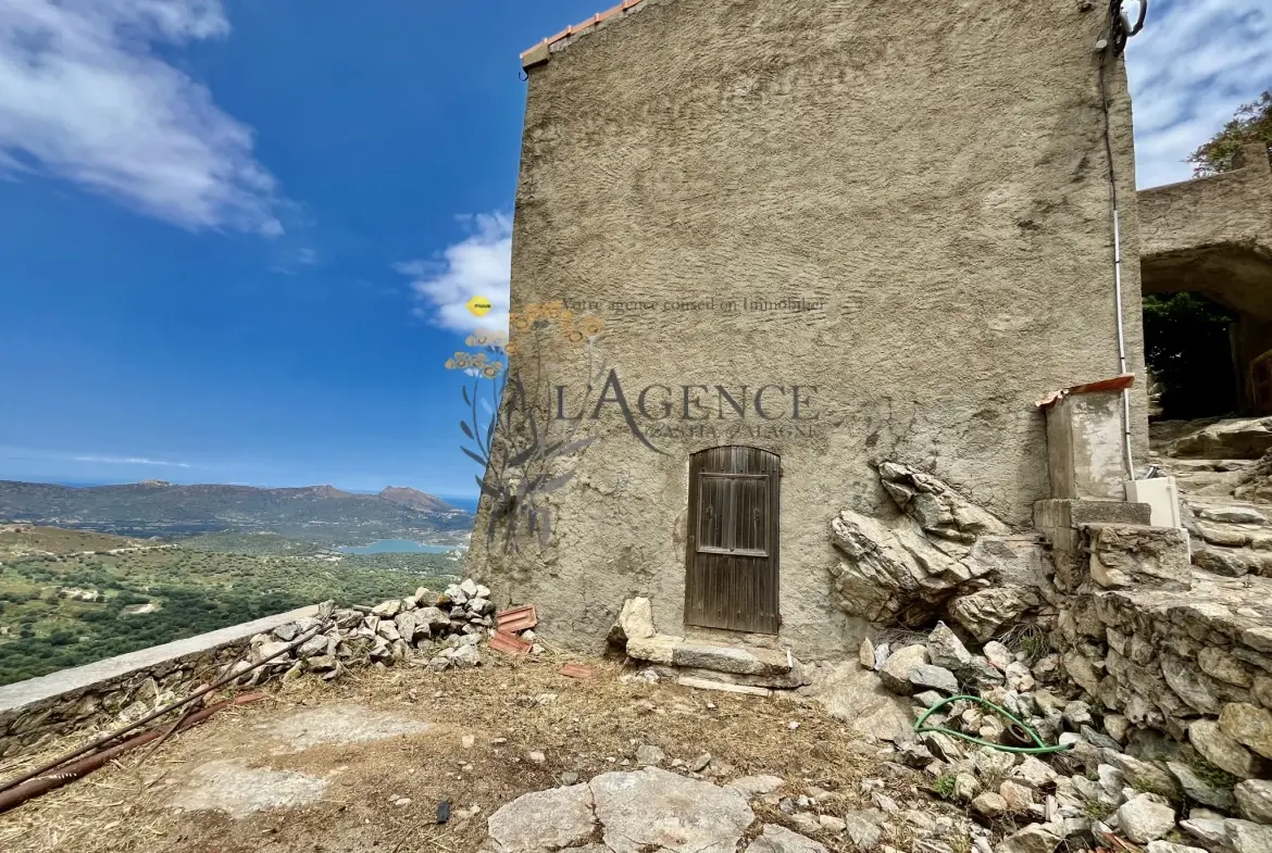 Maison de village historique à Speloncato avec vue mer et montagne 