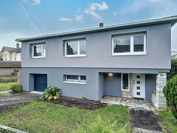 Maison individuelle à Courcelles sur Nied avec 4 chambres, garage et jardin plein sud
