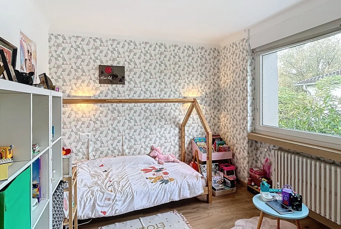 Maison individuelle à Courcelles sur Nied avec 4 chambres, garage et jardin plein sud 