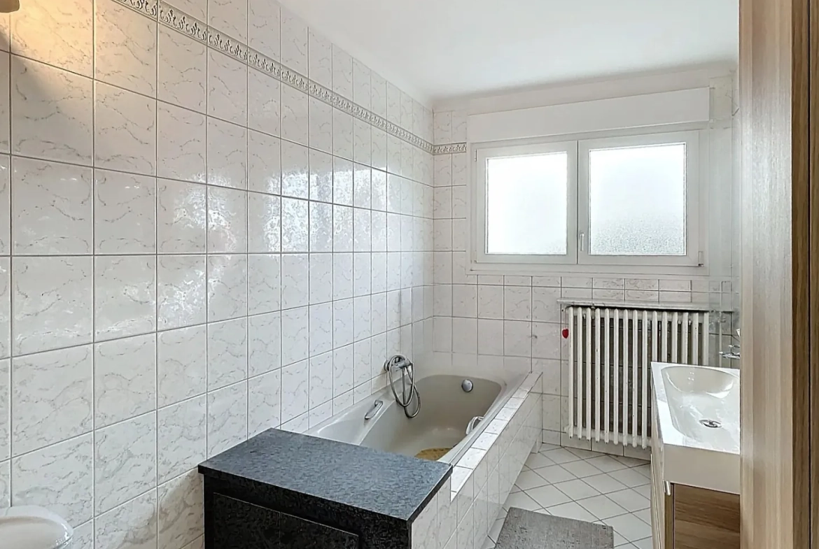 Maison individuelle à Courcelles sur Nied avec 4 chambres, garage et jardin plein sud 