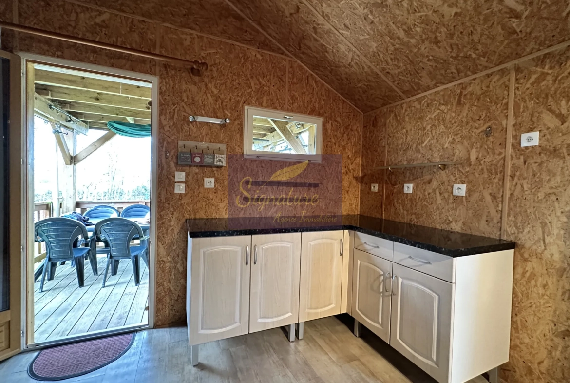 Superbe terrain de loisir en Sarthe avec chalet, terrasse et ponton 
