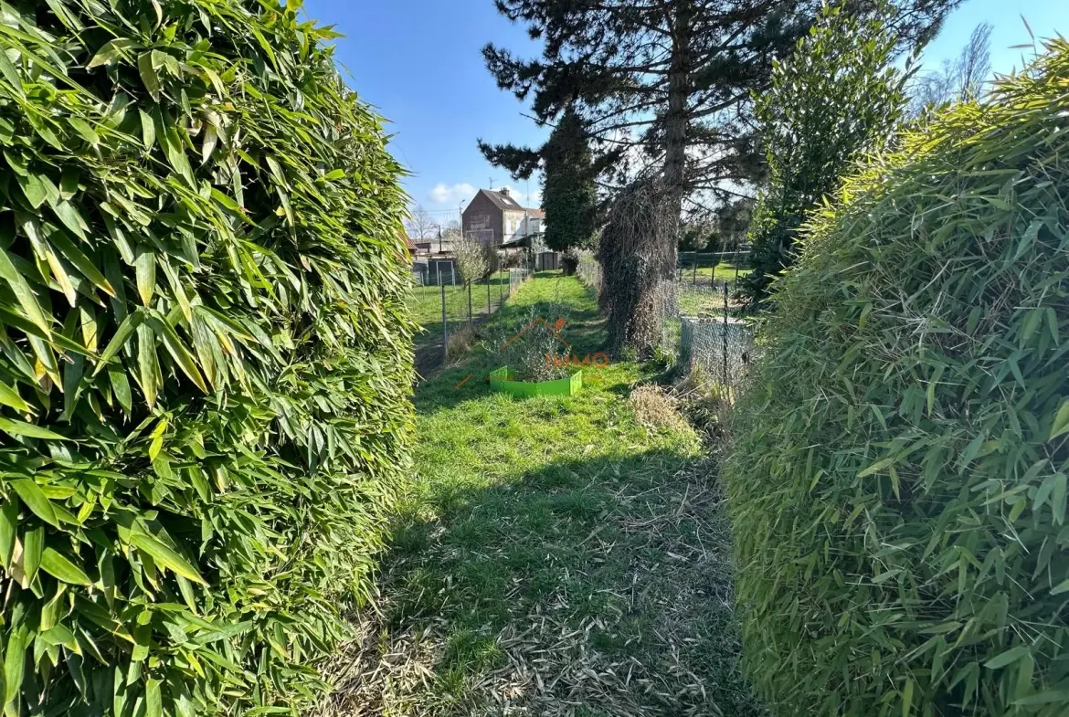 Maison 4 pièces à Raismes de 99,81 m² avec terrasse et terrain 