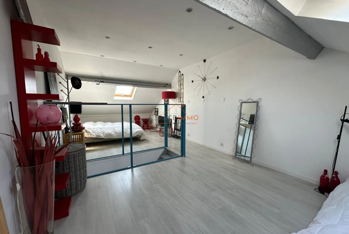 Maison 4 pièces à Raismes de 99,81 m² avec terrasse et terrain 