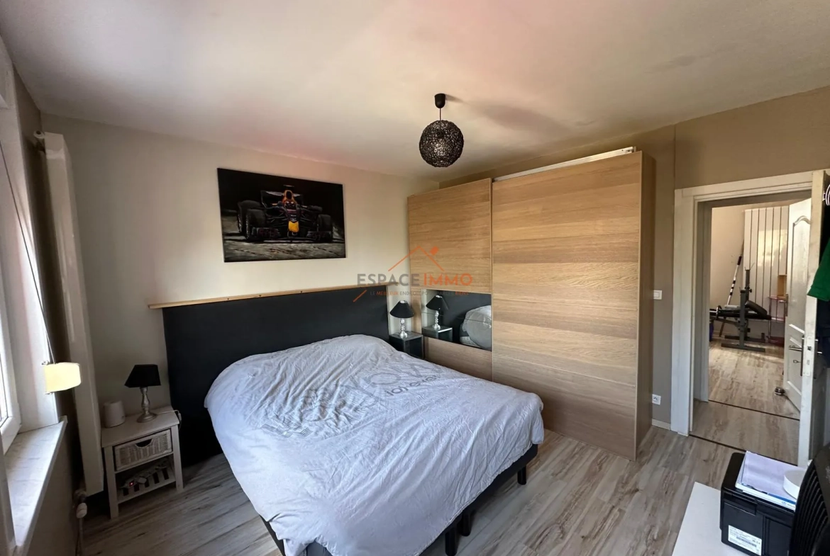Maison 4 pièces à Raismes de 99,81 m² avec terrasse et terrain 