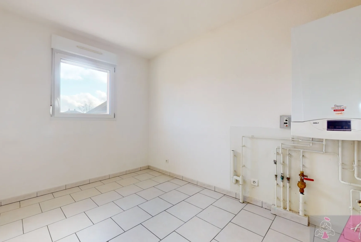 Maison de plain-pied à Foucherans avec 4 chambres, garage et terrasse 