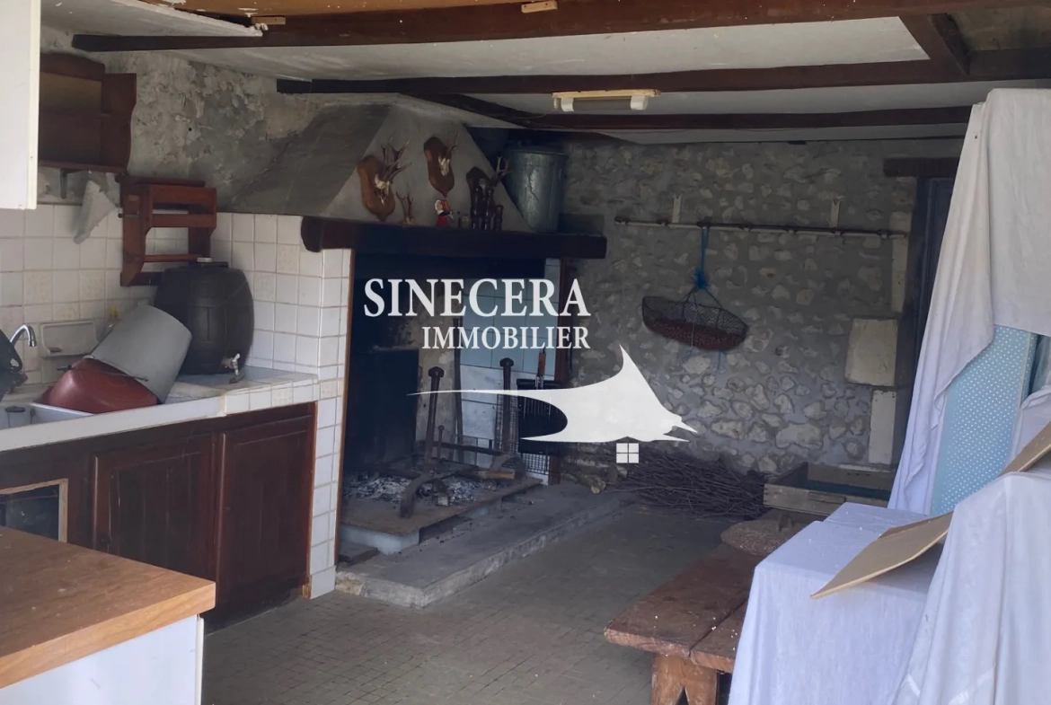 Maison en pierre avec deux habitations indépendantes à Riberac (24) 