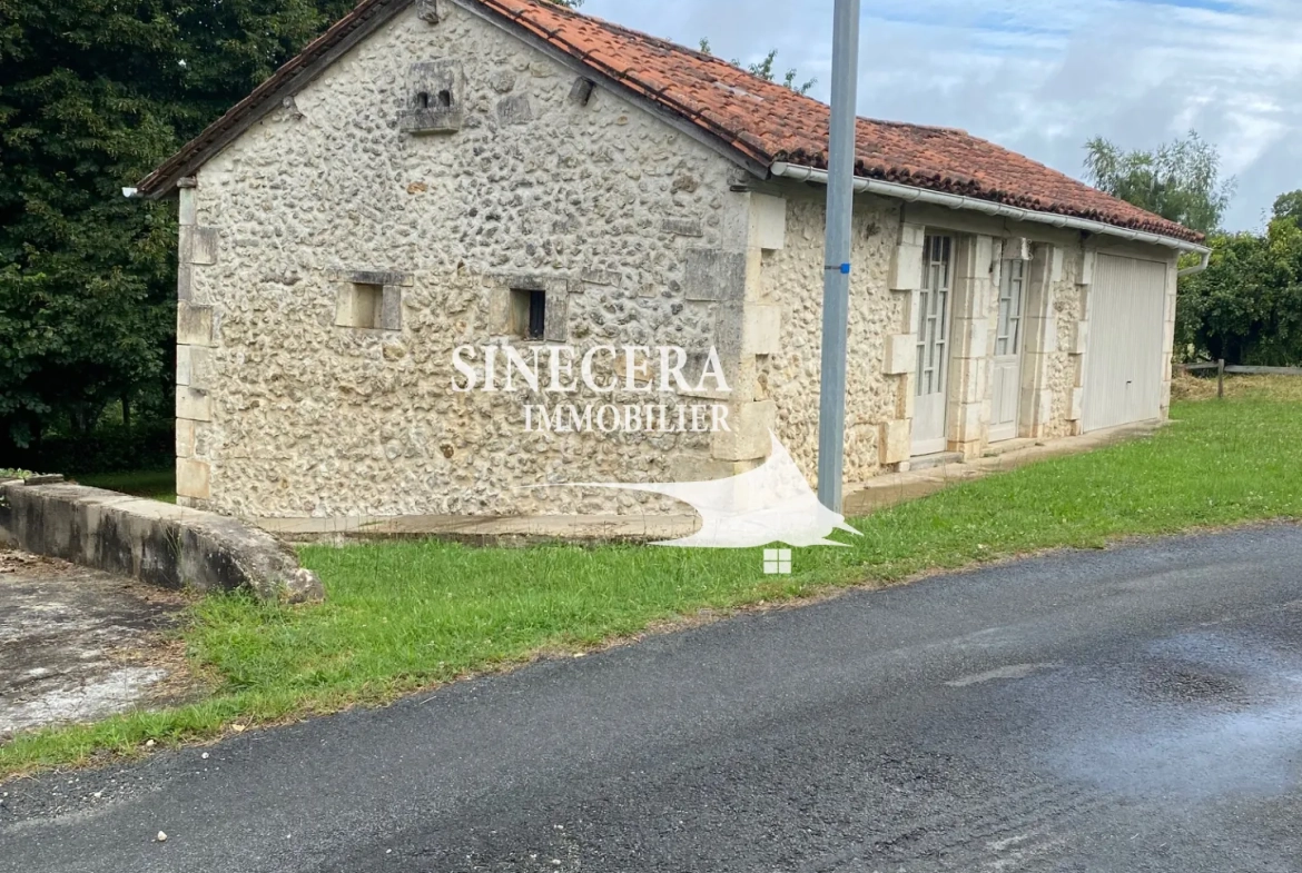 Maison en pierre avec deux habitations indépendantes à Riberac (24) 