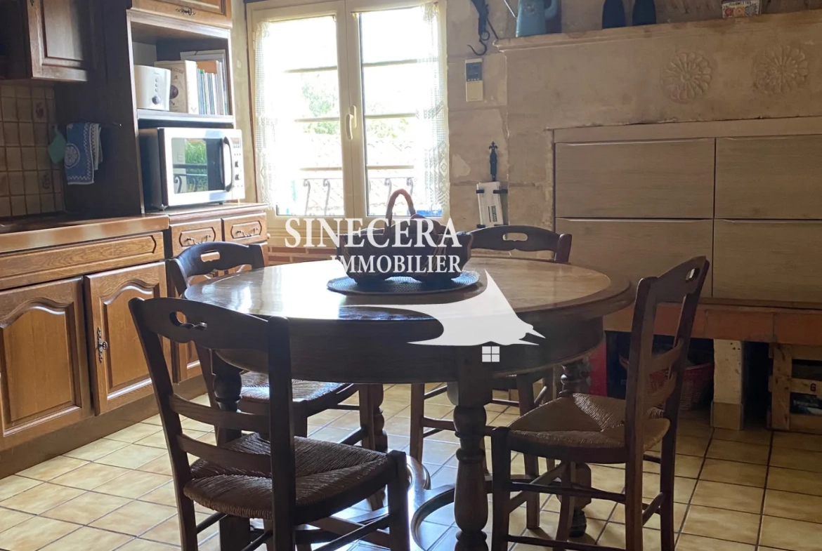 Maison en pierre avec deux habitations indépendantes à Riberac (24) 