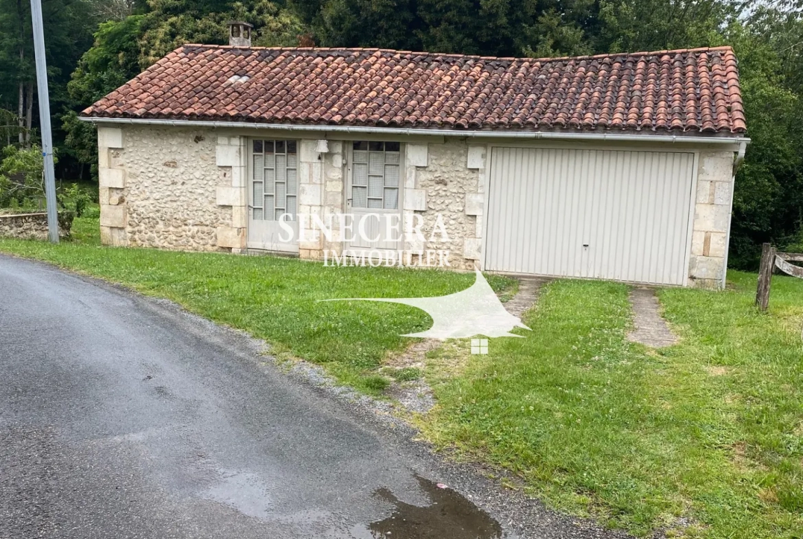 Maison en pierre avec deux habitations indépendantes à Riberac (24) 
