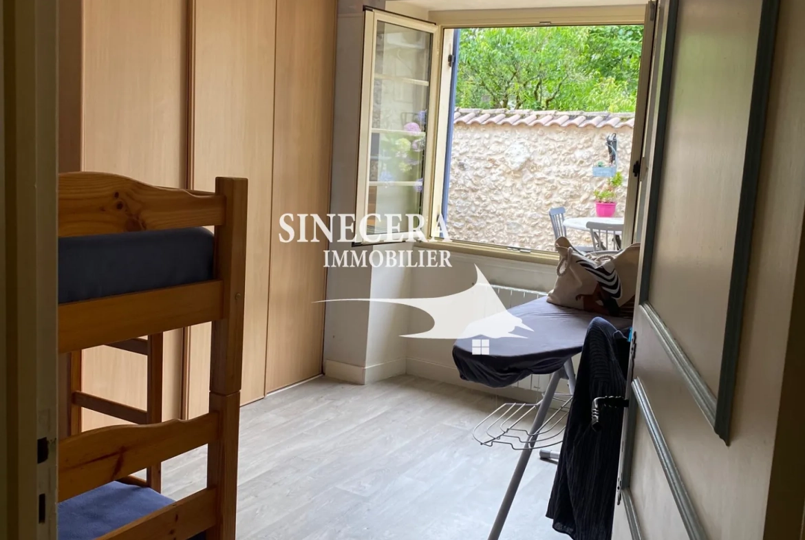 Maison en pierre avec deux habitations indépendantes à Riberac (24) 