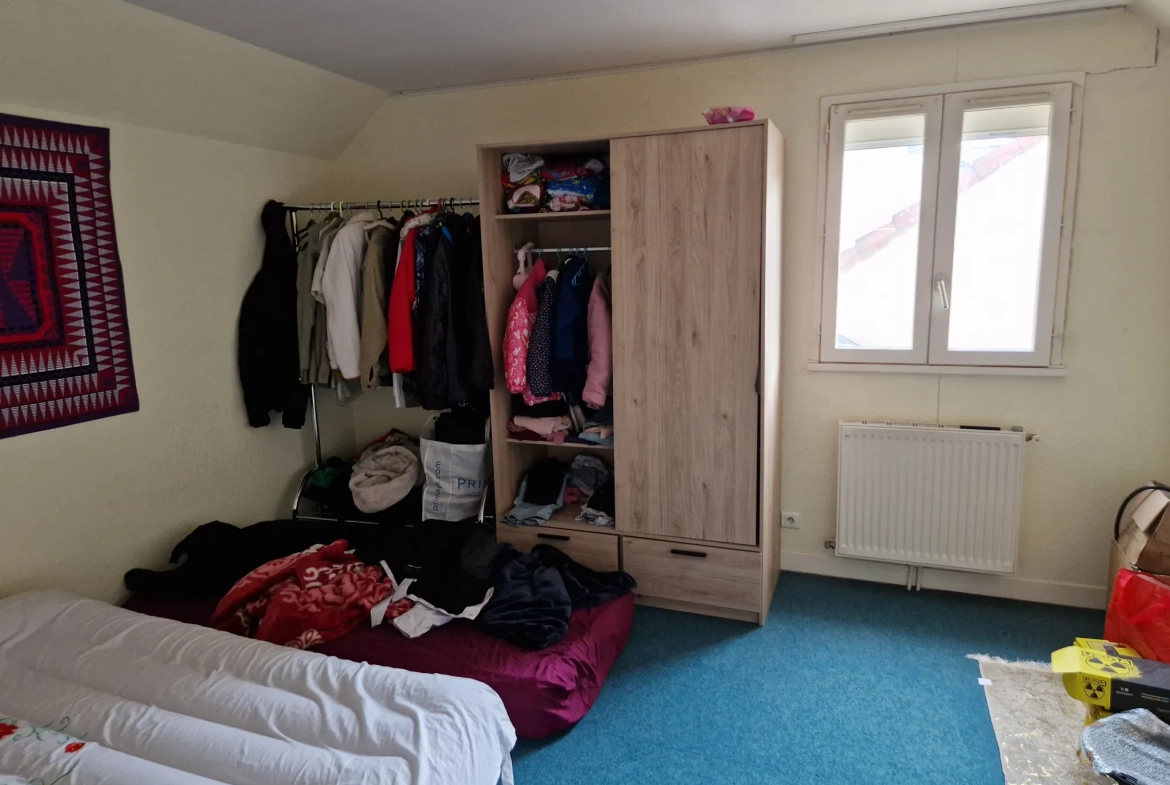Maison de 110m² avec jardin et garage en centre-ville d'Autun 