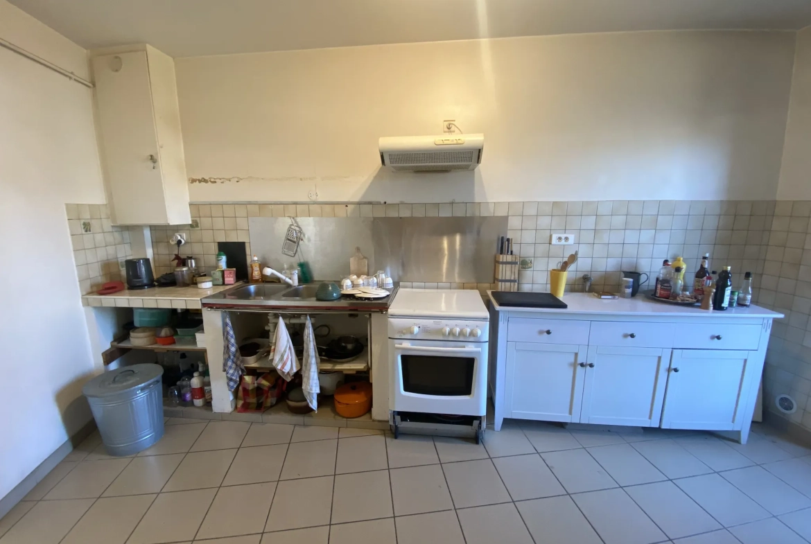 Maison de ville en pierre de 115 m² avec jardin à La Réole 