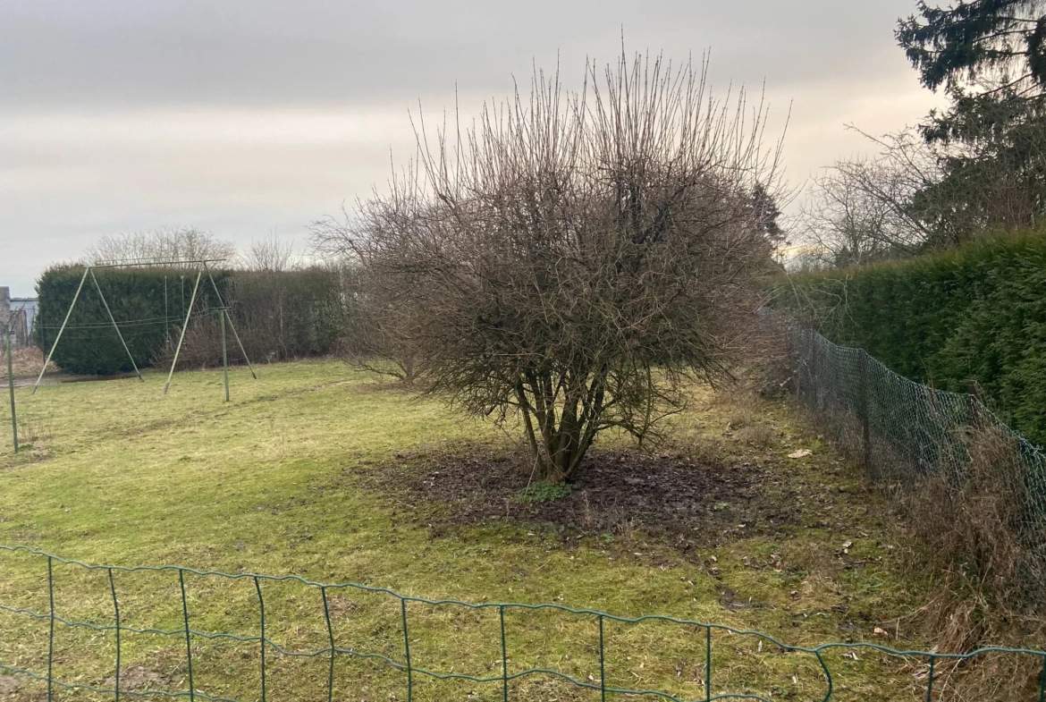 Maison à vendre à Jeumont avec grand terrain, 5 chambres, garage et terrasse 