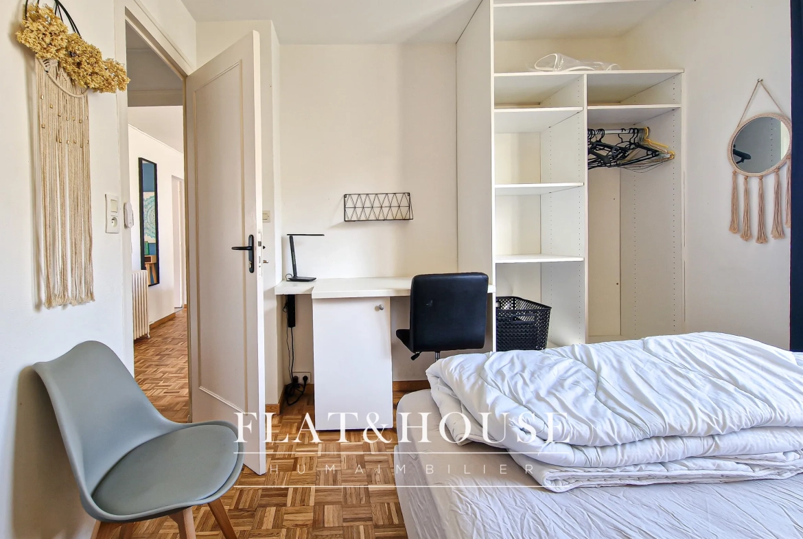 Appartement T4 rénové à Cholet avec balcon et cave, idéal investissement ou résidence principale 