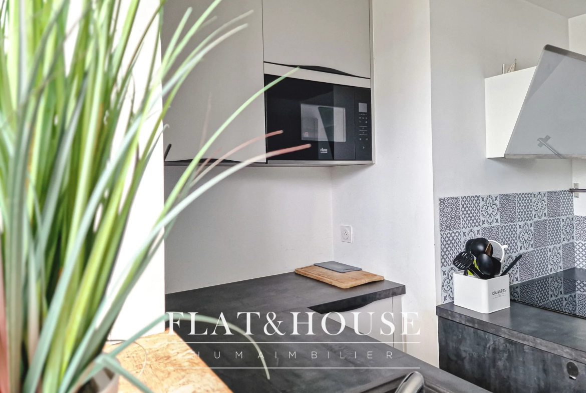 Appartement T4 rénové à Cholet avec balcon et cave, idéal investissement ou résidence principale 