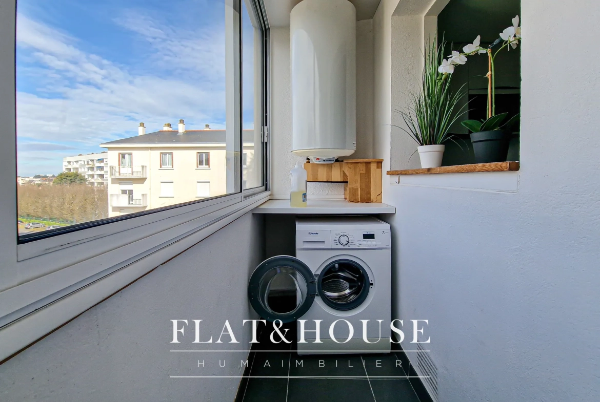 Appartement T4 rénové à Cholet avec balcon et cave, idéal investissement ou résidence principale 