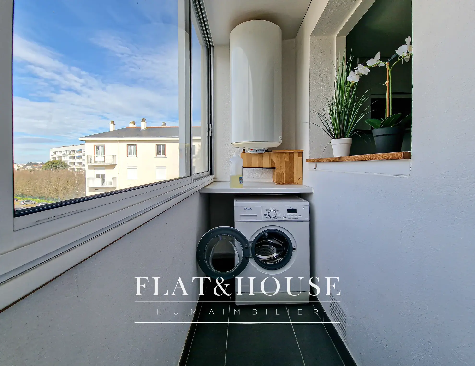 Appartement T4 rénové à Cholet avec balcon et cave, idéal investissement ou résidence principale 
