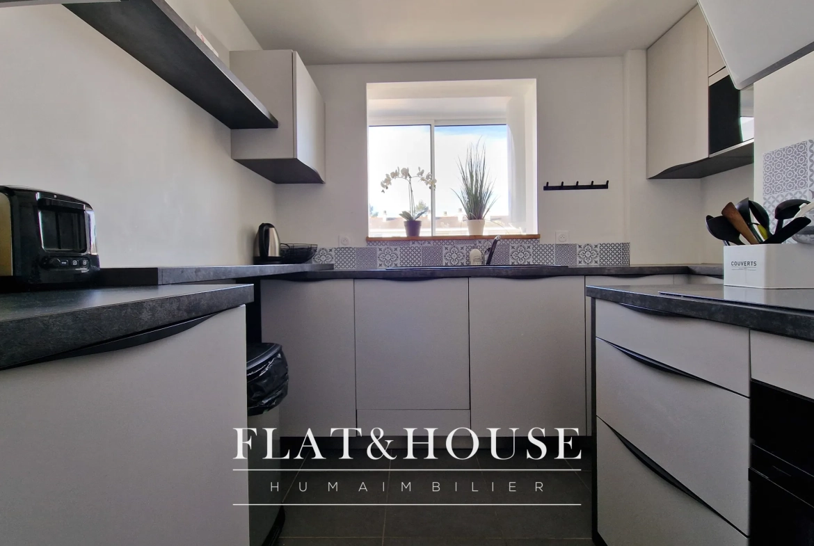 Appartement T4 rénové à Cholet avec balcon et cave, idéal investissement ou résidence principale 