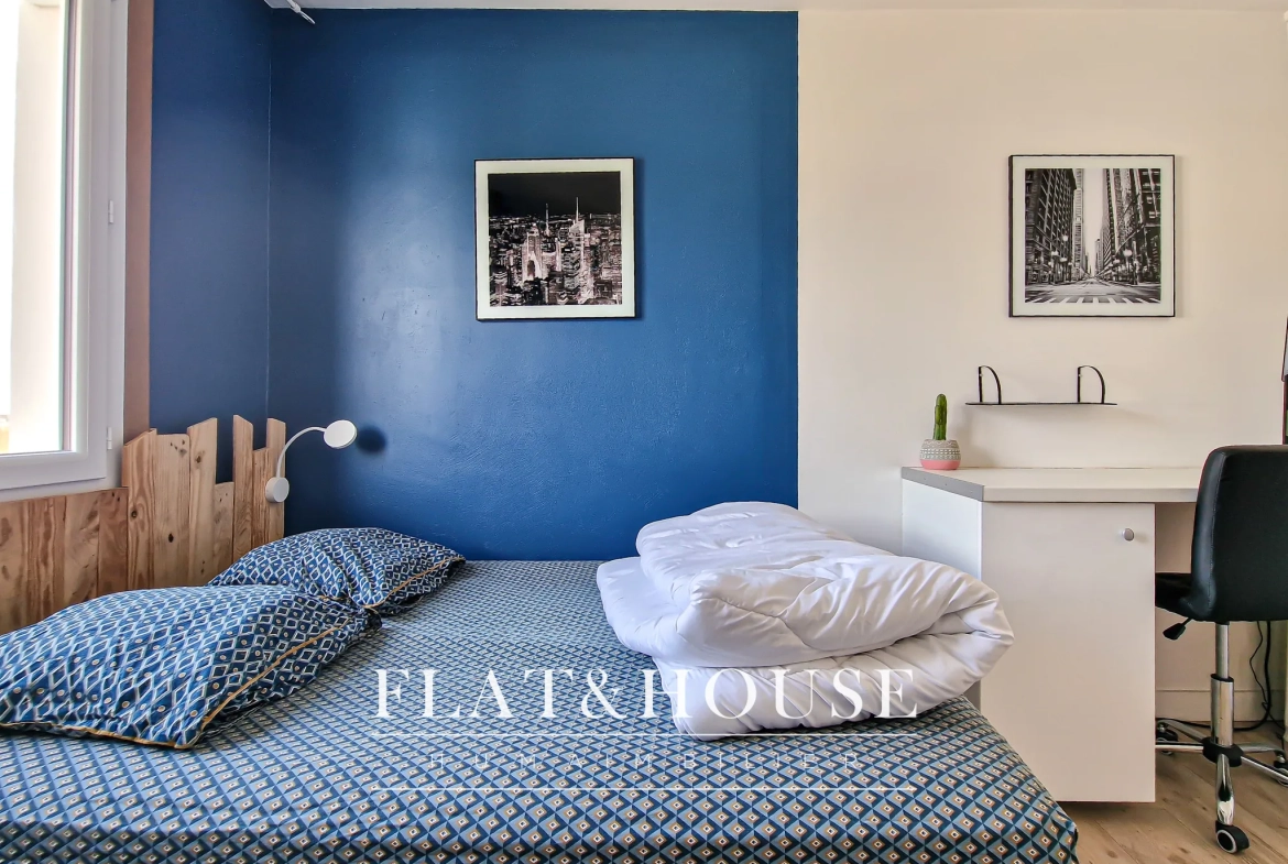 Appartement T4 rénové à Cholet avec balcon et cave, idéal investissement ou résidence principale 