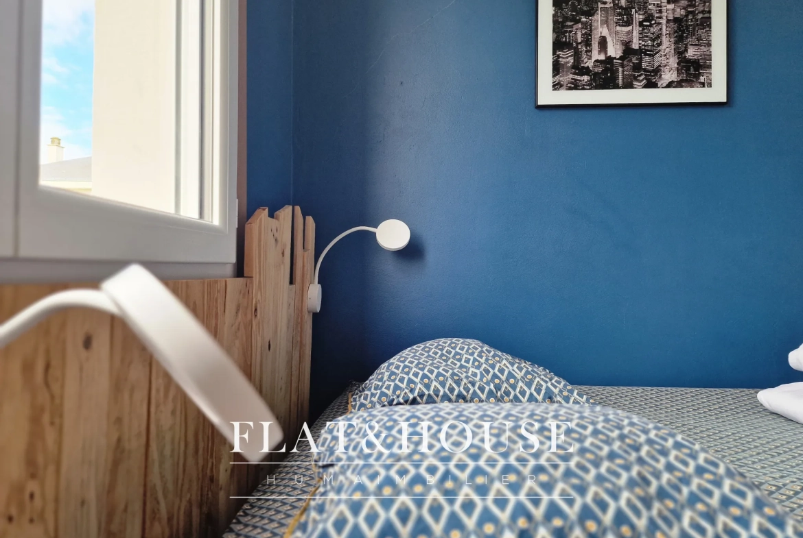 Appartement T4 rénové à Cholet avec balcon et cave, idéal investissement ou résidence principale 