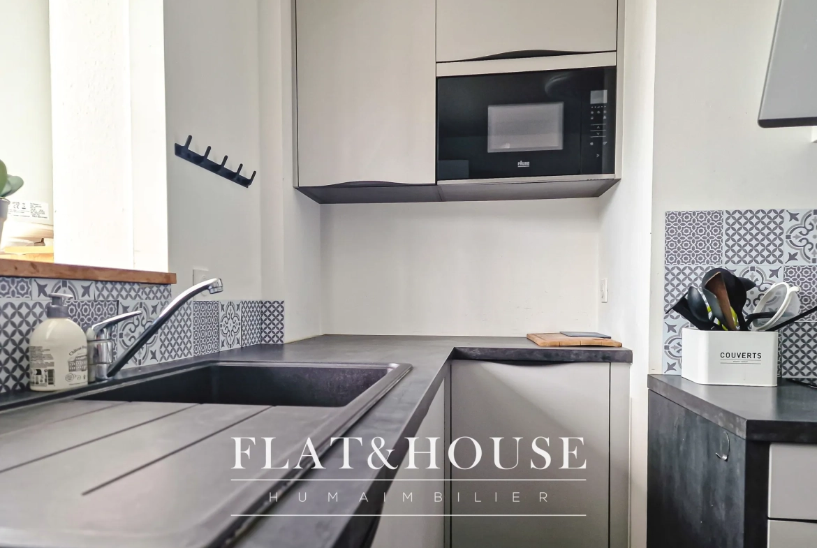 Appartement T4 rénové à Cholet avec balcon et cave, idéal investissement ou résidence principale 