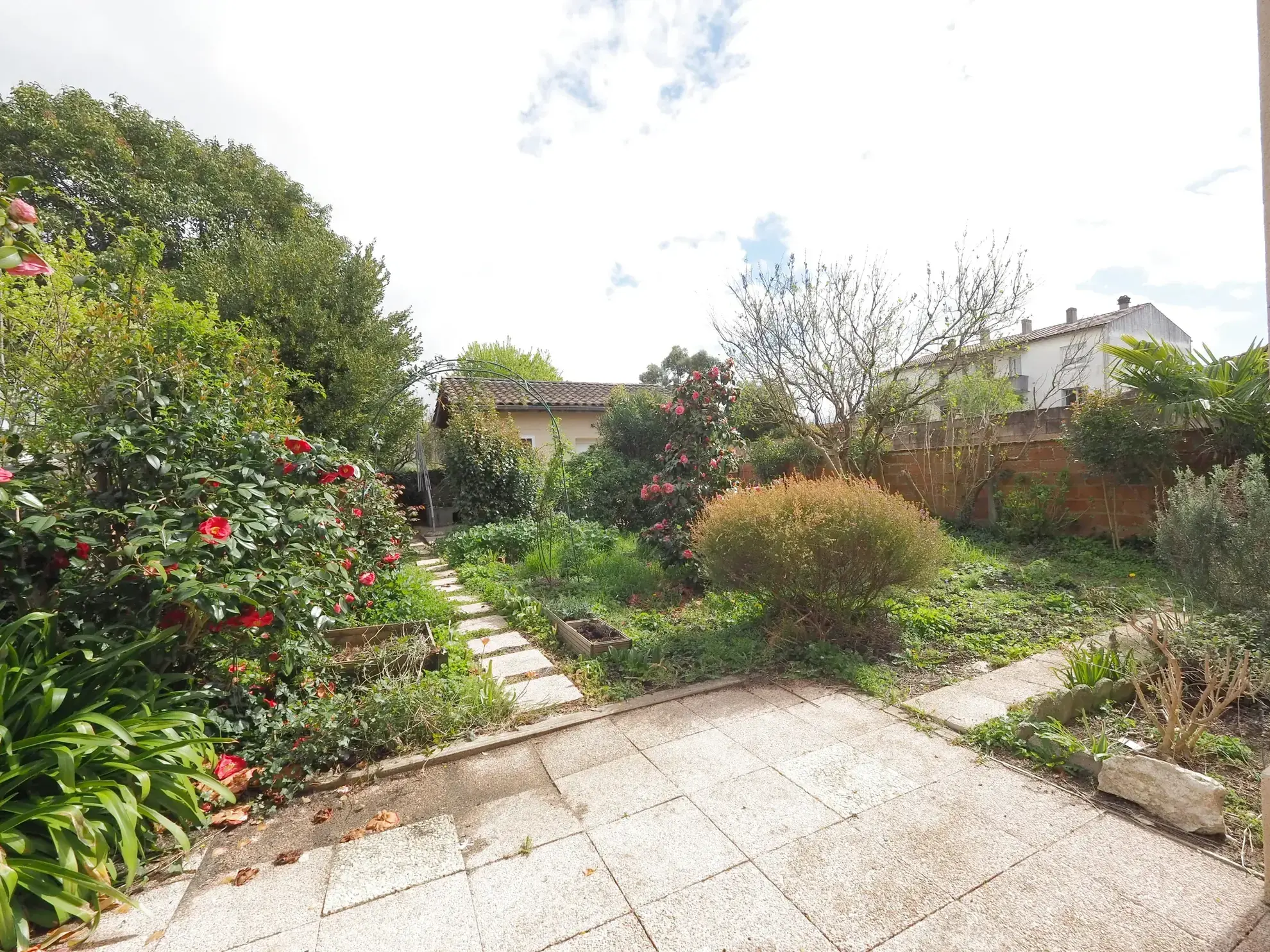 Maison à rénover de 90 m2 avec jardin à Marmande proche centre 