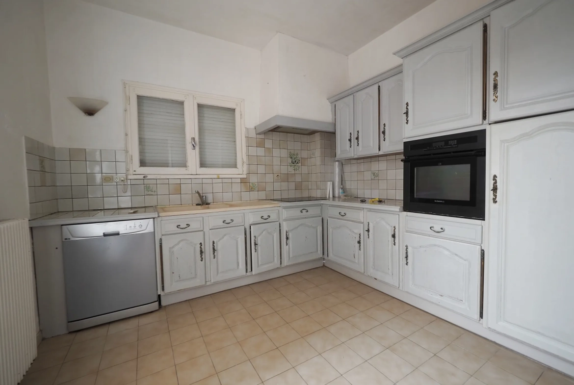 Maison à rénover de 90 m2 avec jardin à Marmande proche centre 
