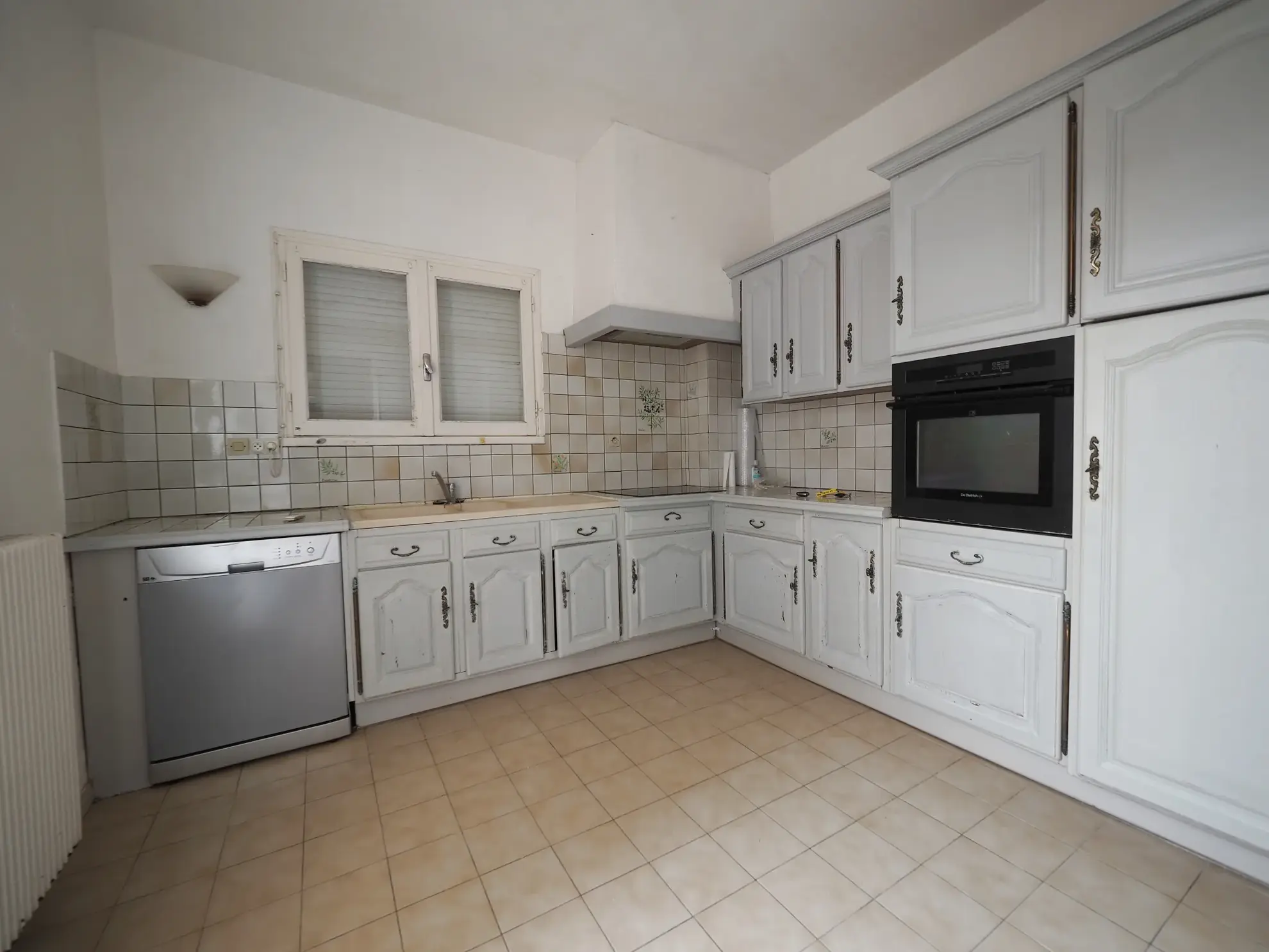 Maison à rénover de 90 m2 avec jardin à Marmande proche centre 