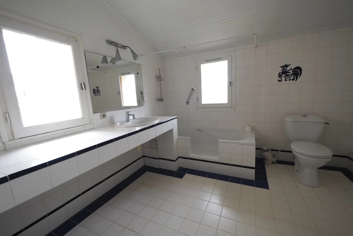 Maison à rénover de 90 m2 avec jardin à Marmande proche centre 